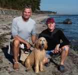 Robert Skene, his partmer Kirk Williams and Bella at Air Force Beach Comox. They now live in Crown Isle, Courtenay. Robert still works for the City of N. Vanc., and Kirk can answer any of your Real Estate questions as he is now a licenced agent!